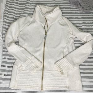High collar zip up